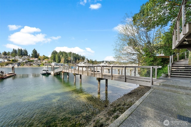 view of dock with a water view and stairway