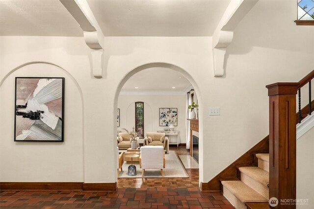 1919 Shenandoah Dr E, Seattle, WA 98112 - entryway featuring stairway, arched walkways, baseboards, and ornamental molding