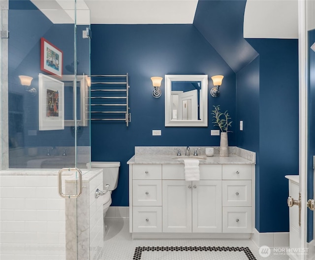 1919 Shenandoah Dr E, Seattle, WA 98112 - bathroom featuring a stall shower, tile patterned flooring, vaulted ceiling, vanity, and toilet