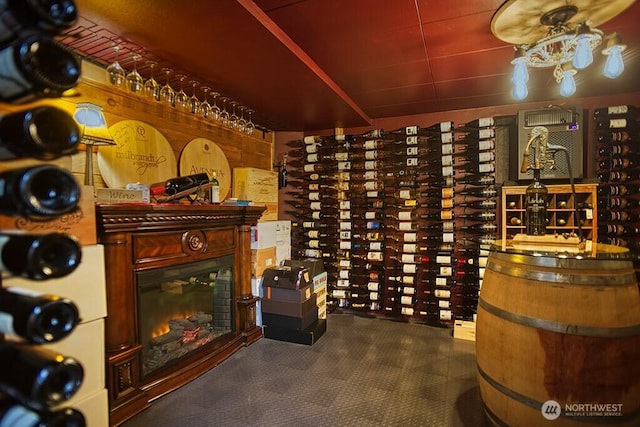 1305 10th St, Everett, WA 98201 - wine room featuring a glass covered fireplace and dark colored carpet