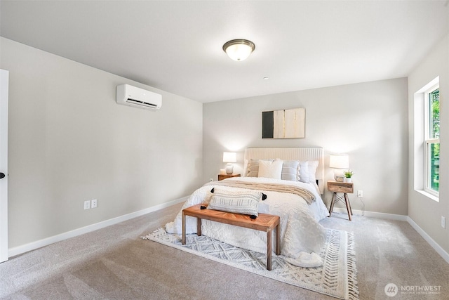 carpeted bedroom featuring baseboards and a wall unit AC