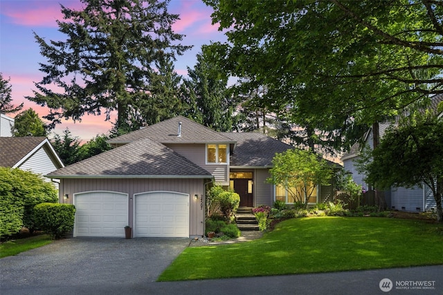 24507 SE 37th St, Sammamish, WA 98029 - view of front of property featuring an attached garage, driveway, a yard, board and batten siding, and roof with shingles