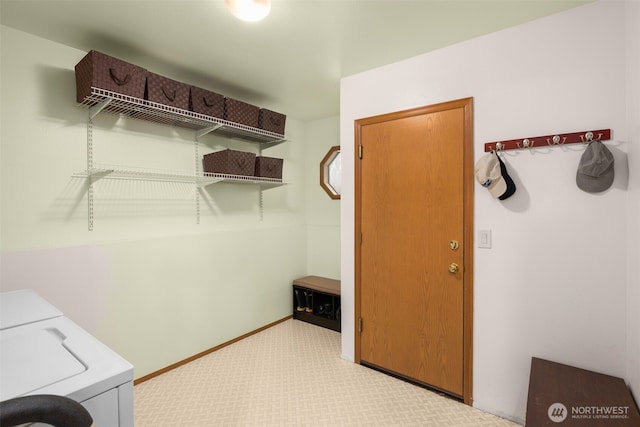 24507 SE 37th St, Sammamish, WA 98029 - washroom featuring washer and dryer and baseboards