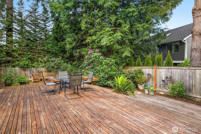 24507 SE 37th St, Sammamish, WA 98029 - wooden deck featuring a fenced backyard and outdoor dining area