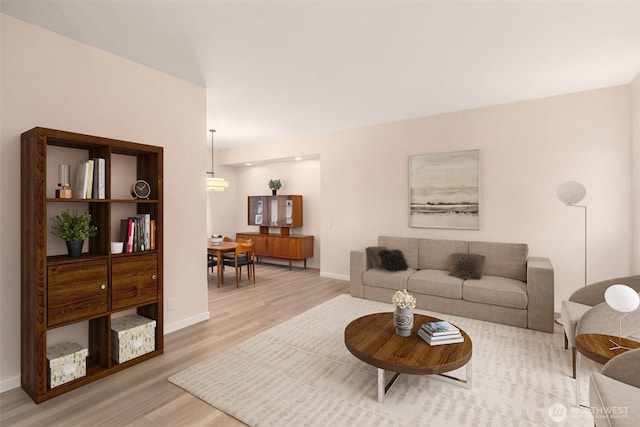 24507 SE 37th St, Sammamish, WA 98029 - living room with light wood-style flooring and baseboards