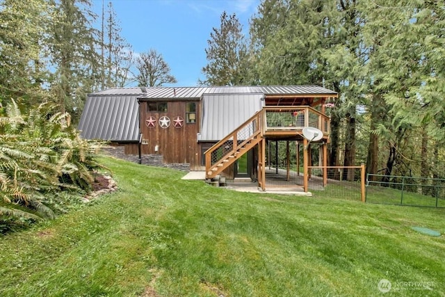 exterior space with fence and stairway