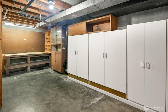 15544 Densmore Ave N, Shoreline, WA 98133 - unfinished below grade area featuring a workshop area