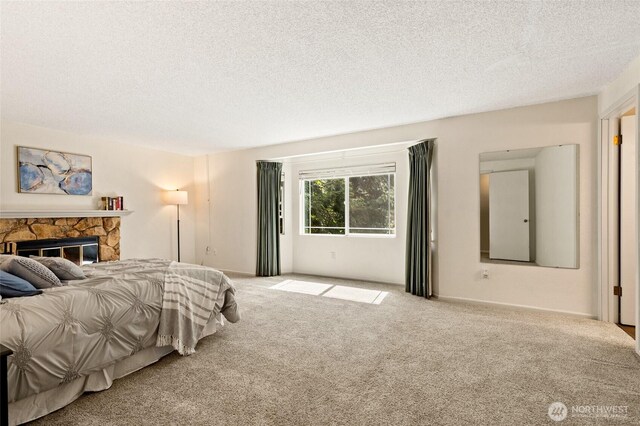 20817 29th Ave SE, Bothell, WA 98021 - bedroom with carpet, a textured ceiling, and a stone fireplace