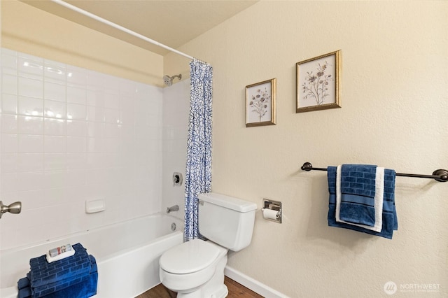 20817 29th Ave SE, Bothell, WA 98021 - bathroom featuring baseboards, toilet, shower / tub combo, and wood finished floors