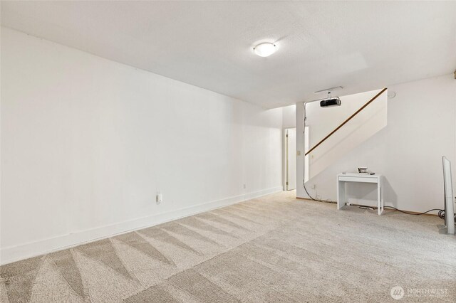 20817 29th Ave SE, Bothell, WA 98021 - finished below grade area with carpet, stairway, and baseboards