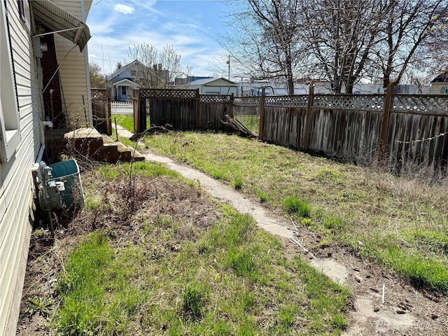 view of yard featuring fence