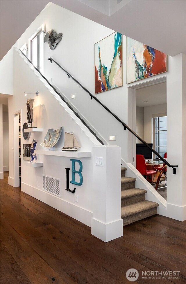 11116 SE 4th St, Bellevue, WA 98004 - staircase featuring baseboards, visible vents, and wood-type flooring
