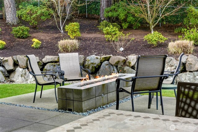 11116 SE 4th St, Bellevue, WA 98004 - view of patio / terrace with a fire pit