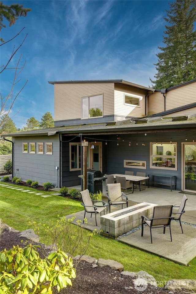 11116 SE 4th St, Bellevue, WA 98004 - back of house with a fire pit, a yard, and a patio