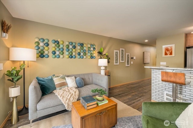 3435 California Ave SW Unit 405, Seattle, WA 98116 - living area featuring wood finished floors, baseboards, and recessed lighting