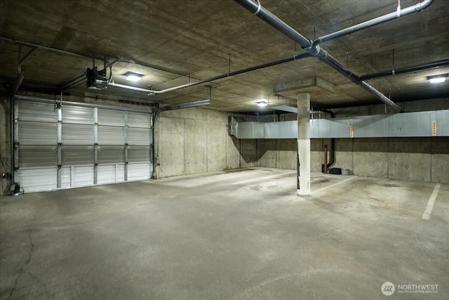 3435 California Ave SW Unit 405, Seattle, WA 98116 - garage with a garage door opener