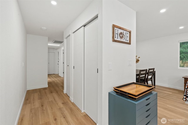 8710 Homestead Ave NE, Olympia, WA 98516 - hallway featuring light wood-style floors and recessed lighting