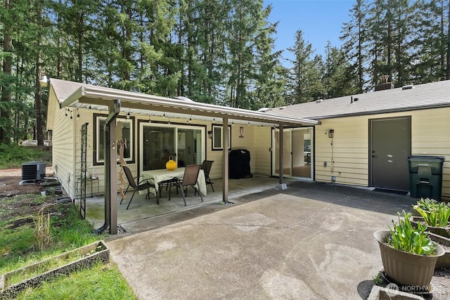 8710 Homestead Ave NE, Olympia, WA 98516 - rear view of house featuring a patio