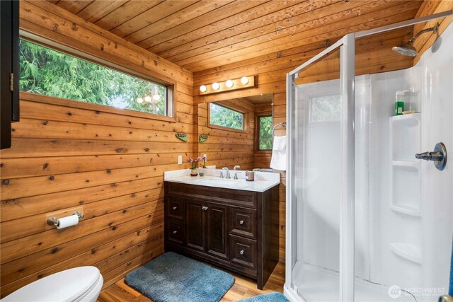 37902 278th Ave SE, Enumclaw, WA 98022 - bathroom with vanity, toilet, a shower stall, and wood finished floors