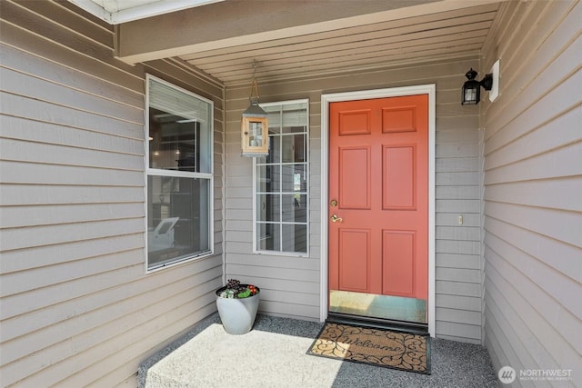 doorway to property with covered porch