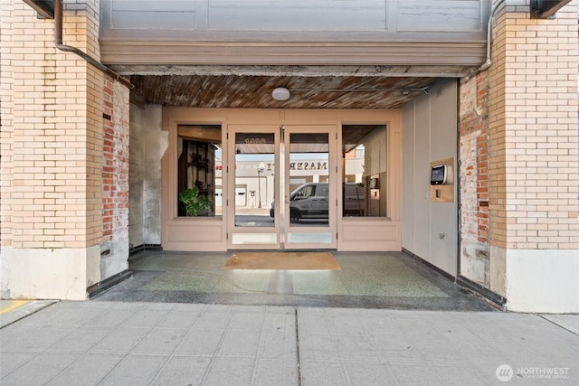 1408 12th Ave Unit 507, Seattle, WA 98122 - view of exterior entry with brick siding and french doors