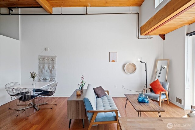 1408 12th Ave Unit 507, Seattle, WA 98122 - sitting room with hardwood / wood-style floors and baseboards