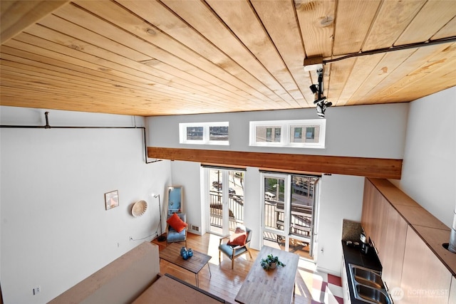 1408 12th Ave Unit 507, Seattle, WA 98122 - living room featuring wood ceiling and wood finished floors