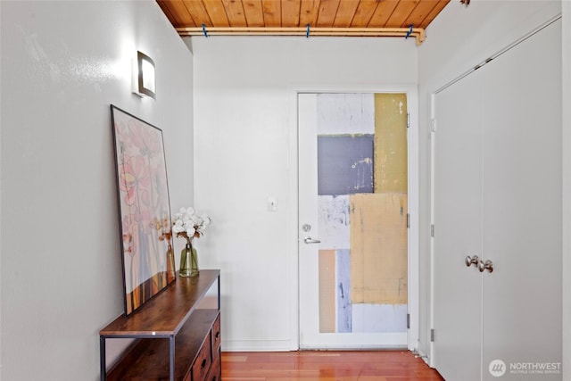 1408 12th Ave Unit 507, Seattle, WA 98122 - hallway featuring wood ceiling and wood finished floors
