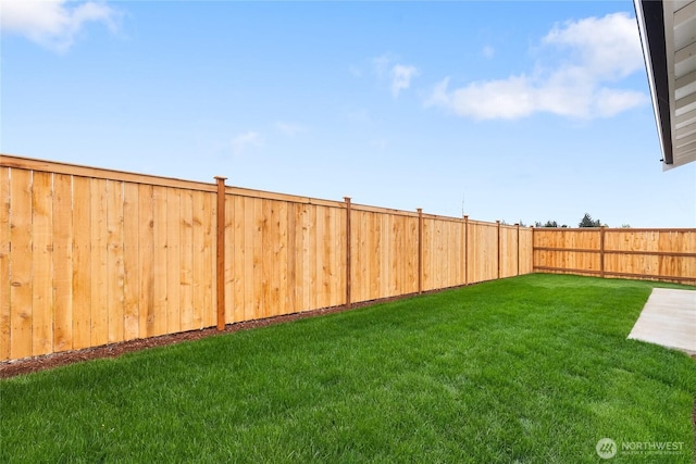view of yard featuring a fenced backyard