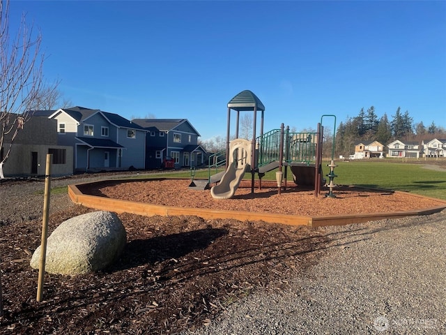 community play area with a residential view
