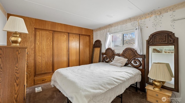 3212 S 182nd Pl Unit 193, Seatac, WA 98188 - bedroom featuring a closet and dark carpet
