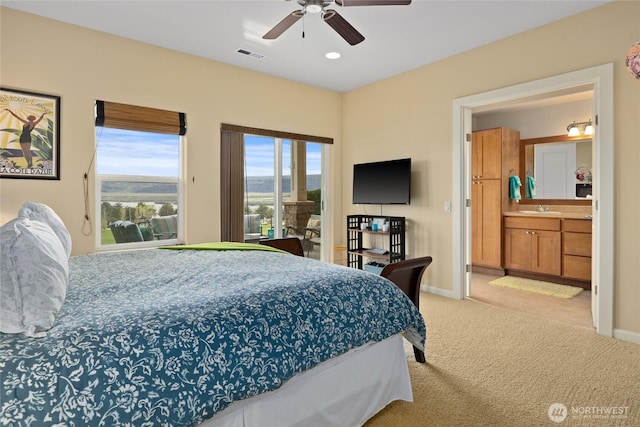 23154 Sunserra Loop NW Unit B15, Quincy, WA 98848 - bedroom featuring carpet floors, a sink, visible vents, and baseboards