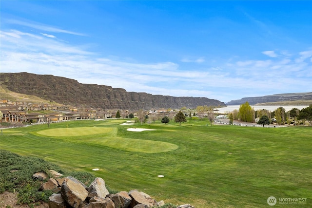 23154 Sunserra Loop NW Unit B15, Quincy, WA 98848 - view of home's community with a lawn, a mountain view, and golf course view