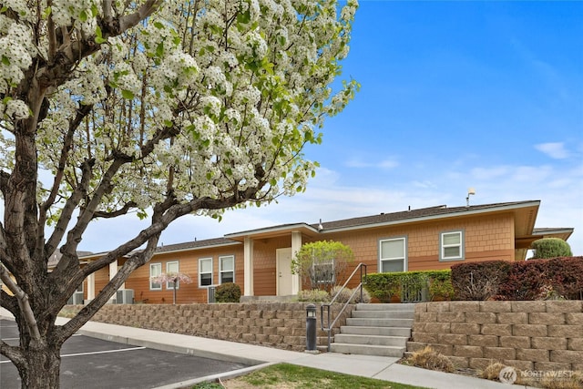 23154 Sunserra Loop NW Unit B15, Quincy, WA 98848 - ranch-style house featuring uncovered parking and central AC unit