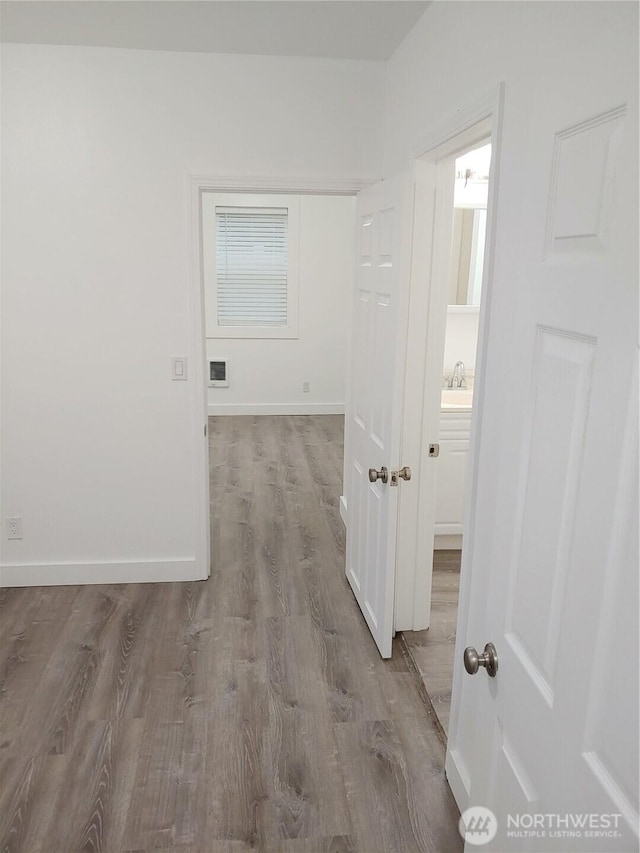 1700 California Ave S, Long Beach, WA 98631 - corridor with wood finished floors and baseboards