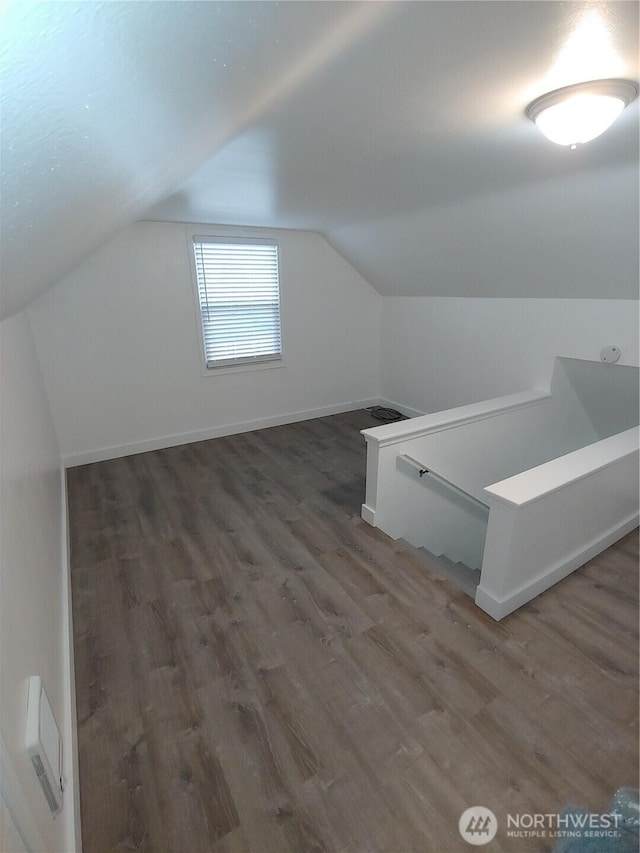 1700 California Ave S, Long Beach, WA 98631 - bonus room featuring lofted ceiling, baseboards, and wood finished floors