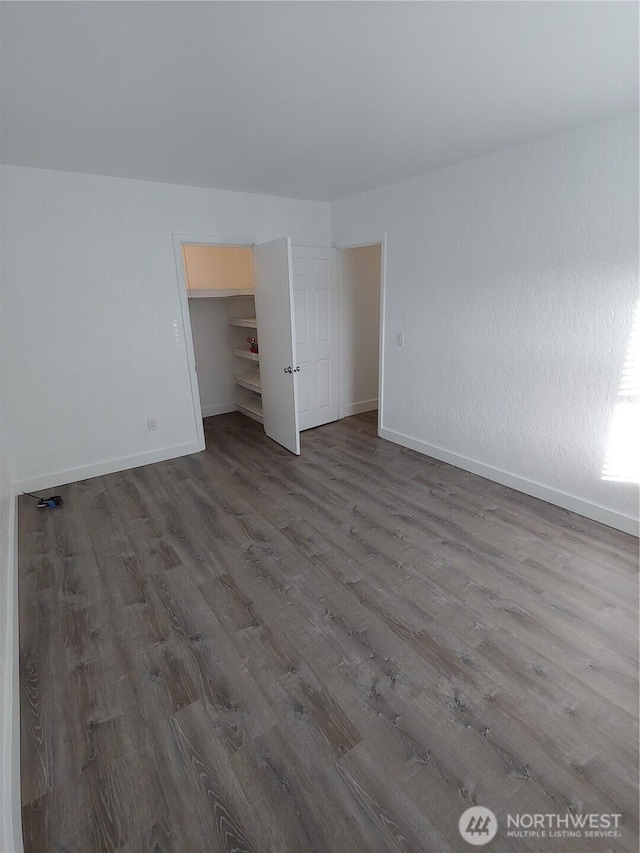 1700 California Ave S, Long Beach, WA 98631 - unfurnished bedroom with baseboards and wood finished floors