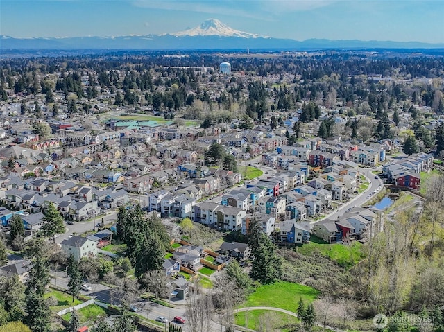 drone / aerial view with a residential view and a mountain view