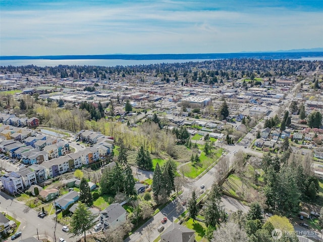 aerial view with a water view and a residential view