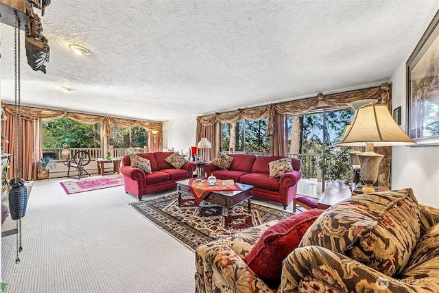 carpeted living room featuring a textured ceiling