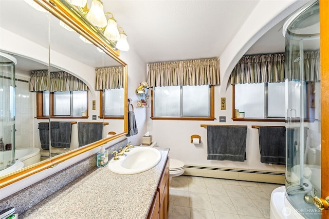 full bath with vanity, baseboard heating, and toilet