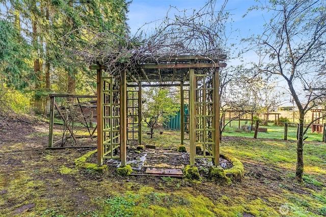 view of outbuilding featuring fence and playground community