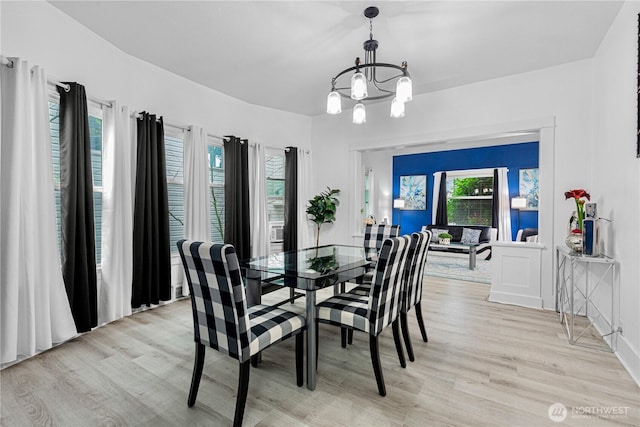819 NW 50th St, Seattle, WA 98107 - dining space with light wood finished floors and an inviting chandelier