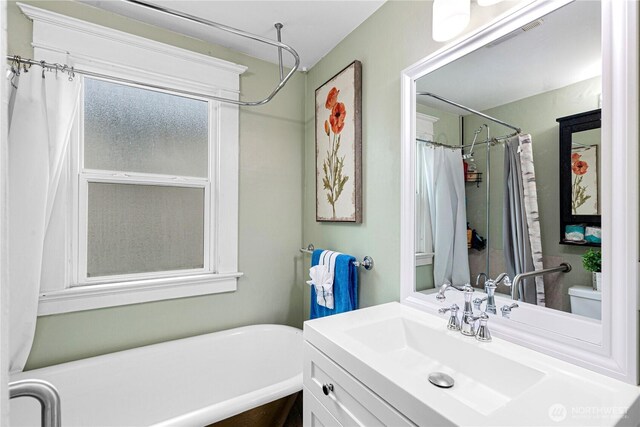 819 NW 50th St, Seattle, WA 98107 - bathroom with a tub and vanity