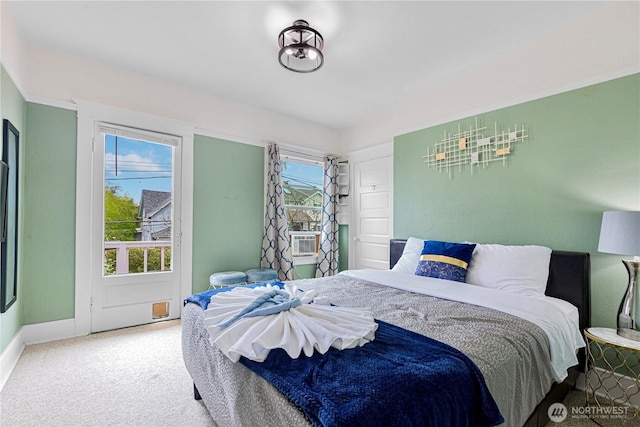 819 NW 50th St, Seattle, WA 98107 - bedroom featuring baseboards, multiple windows, and carpet