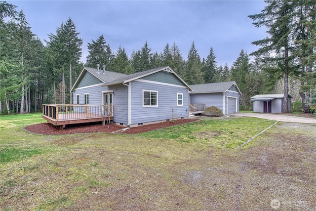 2822 200th Ave SW, Lakebay, WA 98349 - view of front facade featuring an outdoor structure, a wooden deck, a garage, a front lawn, and crawl space