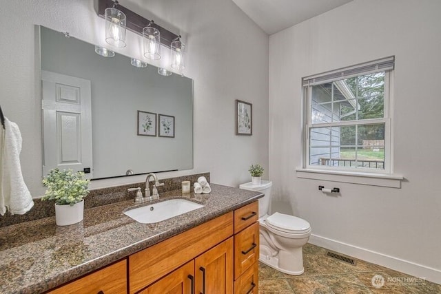 2822 200th Ave SW, Lakebay, WA 98349 - bathroom featuring toilet, baseboards, vanity, and tile patterned floors