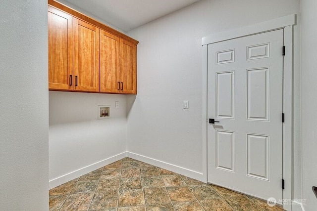 2822 200th Ave SW, Lakebay, WA 98349 - clothes washing area with cabinet space, baseboards, hookup for a washing machine, and stone finish floors