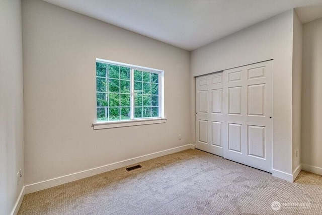 2822 200th Ave SW, Lakebay, WA 98349 - unfurnished bedroom with light colored carpet and baseboards