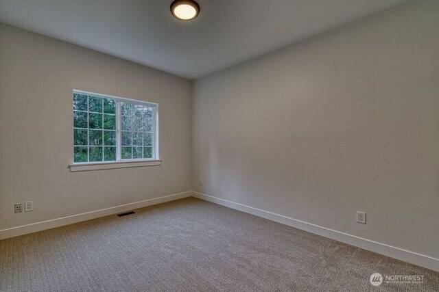 2822 200th Ave SW, Lakebay, WA 98349 - unfurnished room featuring carpet flooring and baseboards